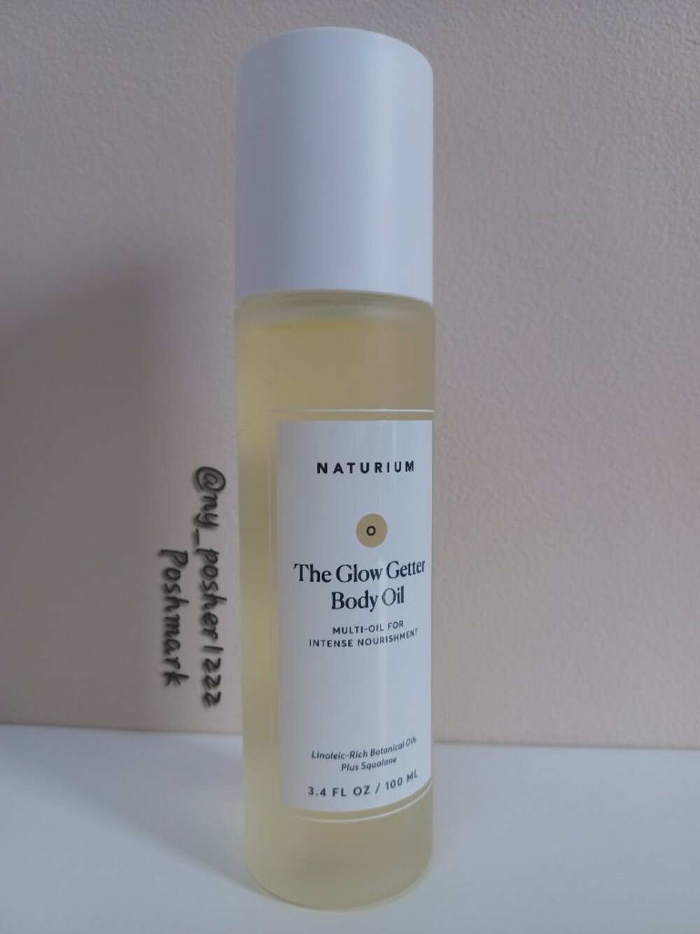𝗡𝗔𝗧𝗨𝗥𝗜𝗨𝗠 𝐓𝐡𝐞 𝐆𝐥𝐨𝐰 𝐆𝐞𝐭𝐭𝐞𝐫 𝐁𝐨𝐝𝐲 𝐎𝐢𝐥 3.4 fl oz/100 ml🟡 - Picture 7 of 16